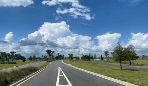 Cloudy skies and an open road